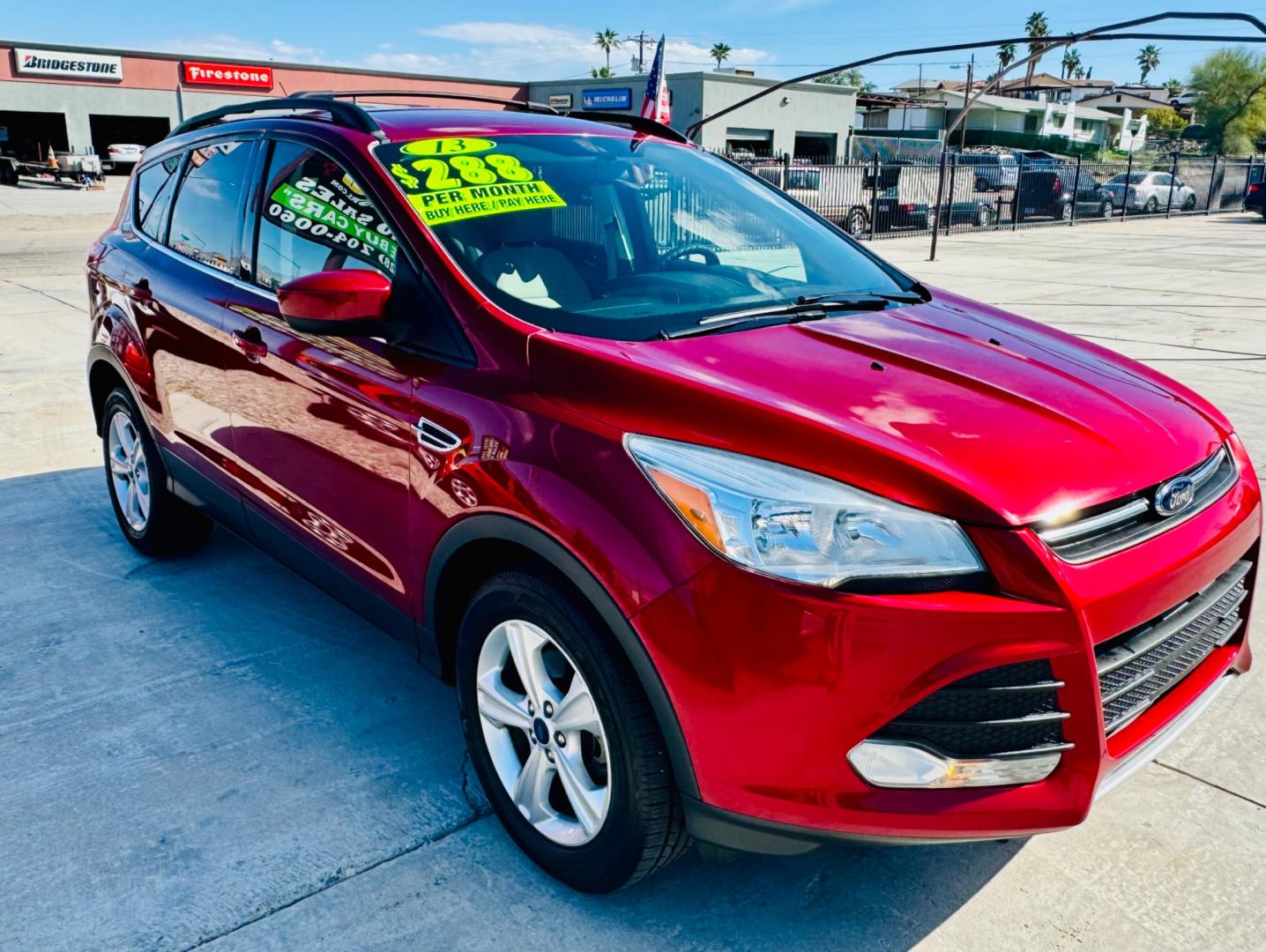 2013 Red Ford Escape (1FMCU0GX3DU) , located at 2190 Hwy 95, Bullhead City, AZ, 86442, (928) 704-0060, 0.000000, 0.000000 - Photo#1